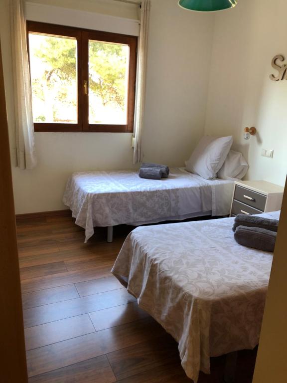 A bed or beds in a room at ***CHALET ALICANTE*** EXPERIENCIA UNICA