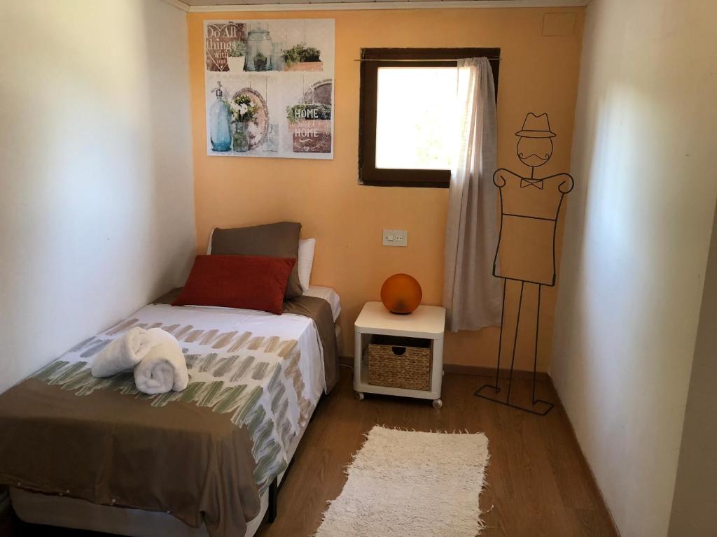 A bed or beds in a room at ***CHALET ALICANTE*** EXPERIENCIA UNICA