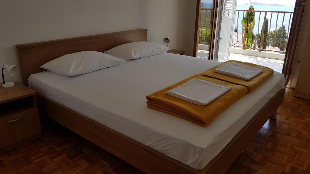 Cama o camas de una habitación en Apartments Kust