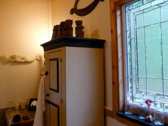 a bathroom with a sink and a window at Magnolia Petal in Ganges