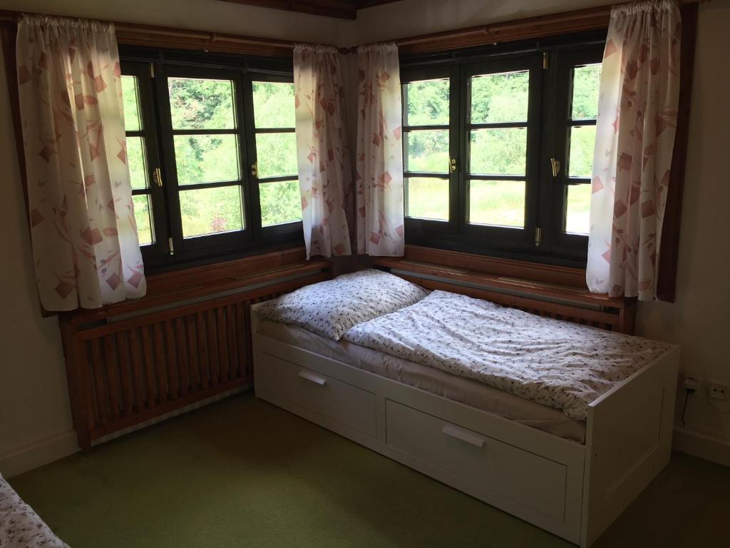 Postel nebo postele na pokoji v ubytování CHATA Privlaky