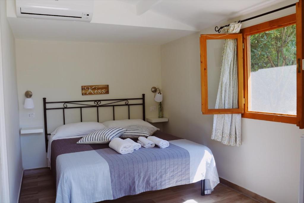 Łóżko lub łóżka w pokoju w obiekcie Agriturismo San Leonardo