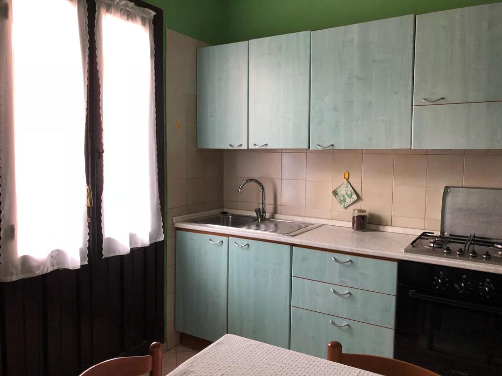 Kuchyň nebo kuchyňský kout v ubytování B&B Beranu