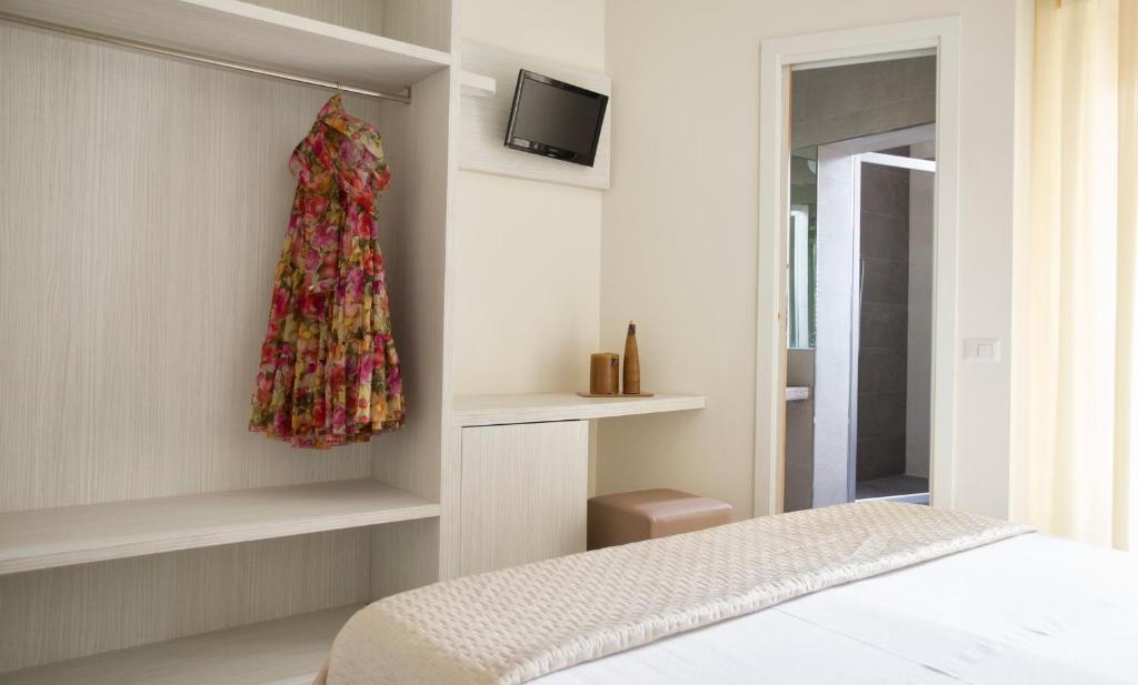 Postel nebo postele na pokoji v ubytování Hotel Clara