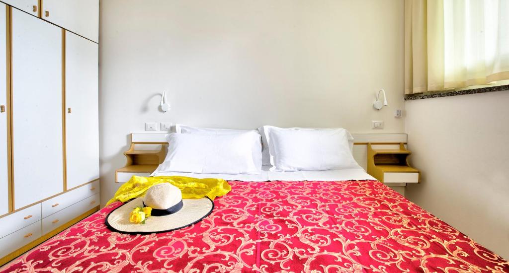 Postel nebo postele na pokoji v ubytování Hotel Clara