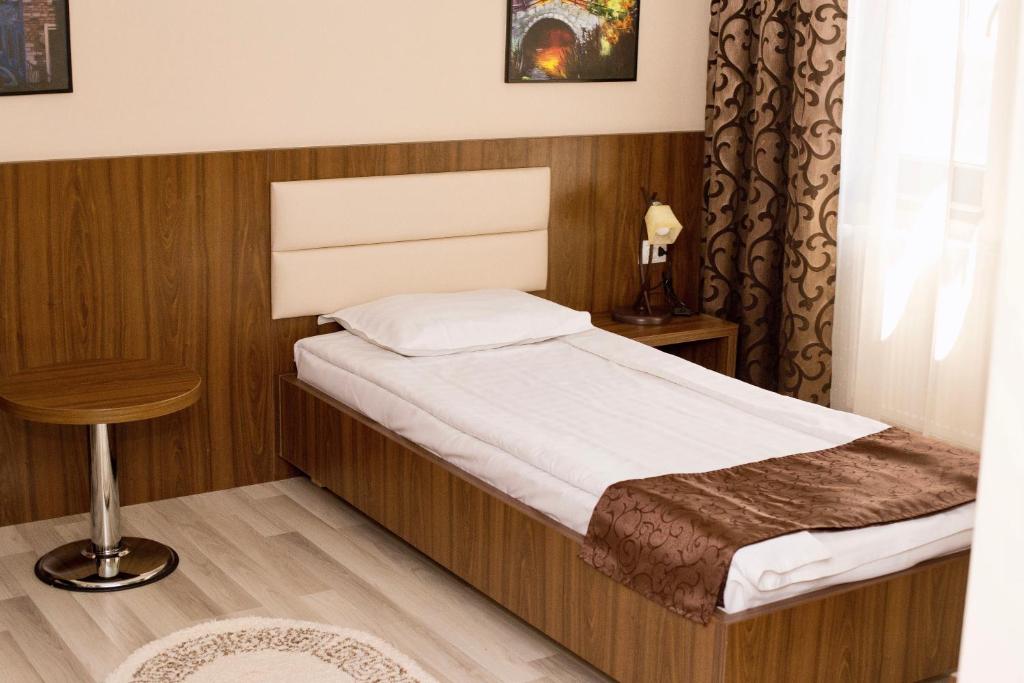 Postel nebo postele na pokoji v ubytování Complex Azar
