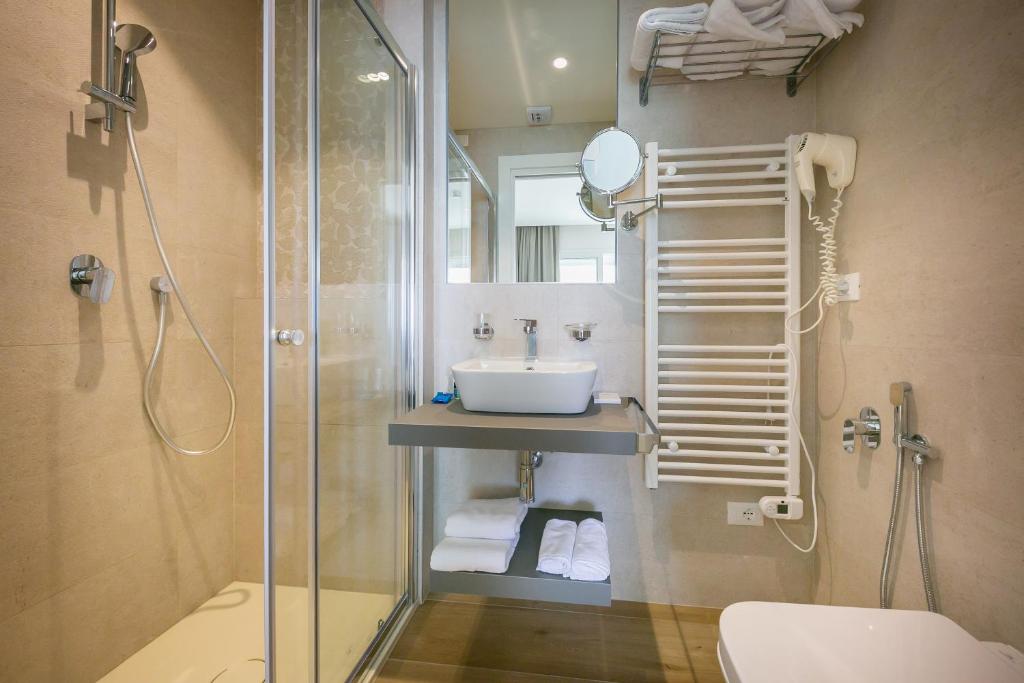Koupelna v ubytování Hotel Le Lampare