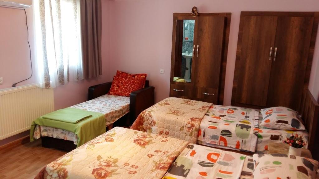 Postel nebo postele na pokoji v ubytování Guest House Panda