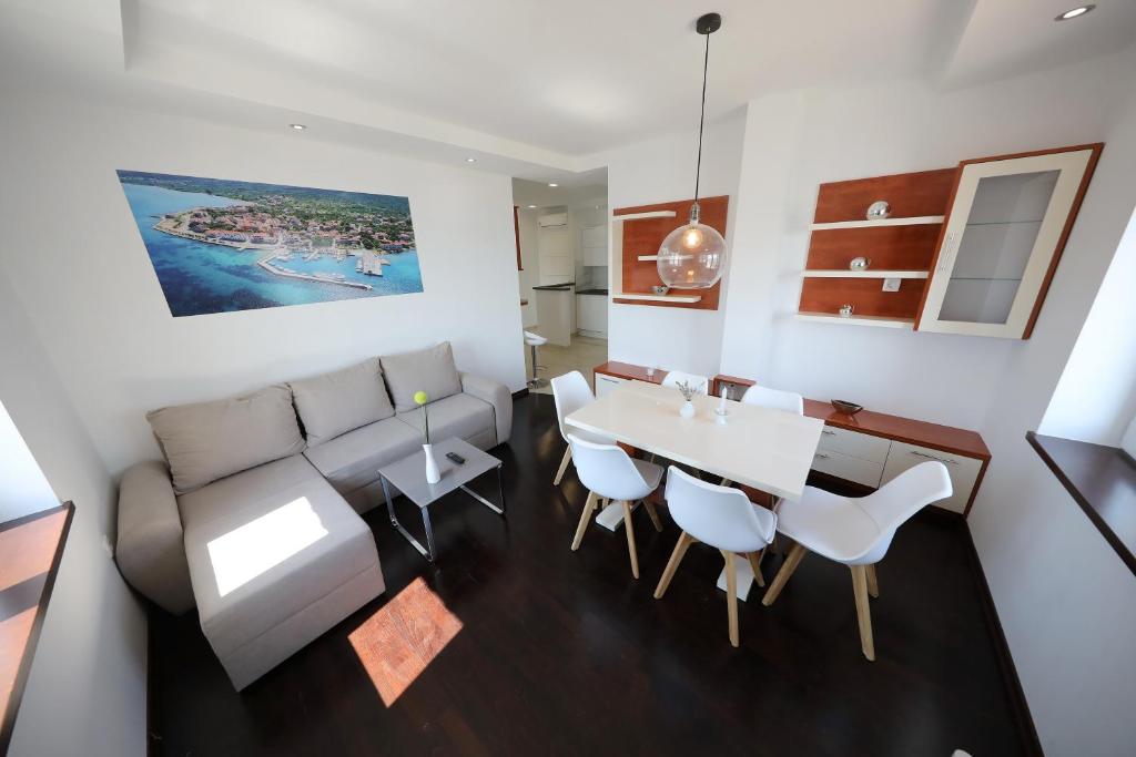 Posedenie v ubytovaní Apartmani Postimana