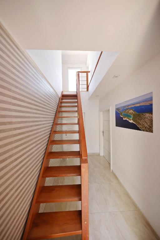 Fotografia z galérie ubytovania Apartmani Postimana v destinácii Pašman