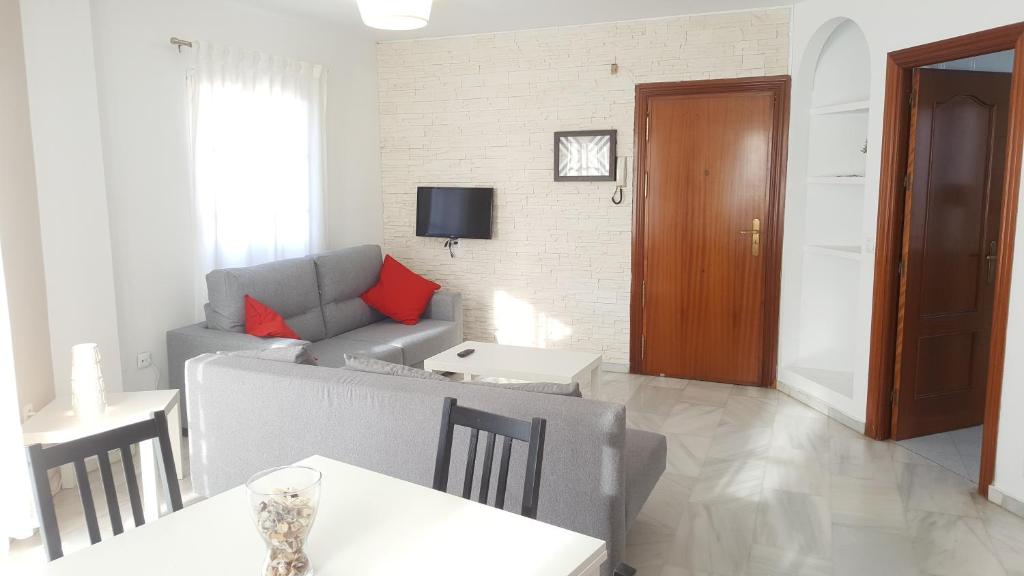 Televízia a/alebo spoločenská miestnosť v ubytovaní APT GUADALHORCE by Malaga Picasso Rentals Selection