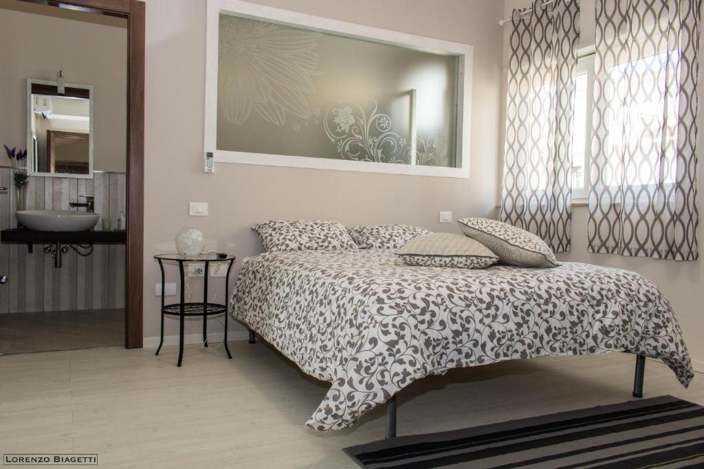 Postel nebo postele na pokoji v ubytování B&B Geolja