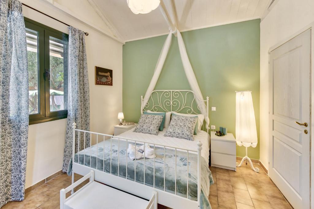 Postel nebo postele na pokoji v ubytování Villa Canella