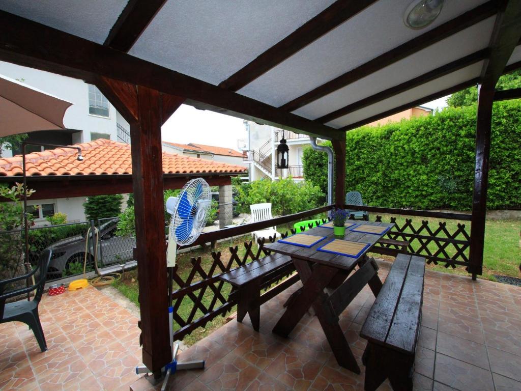 Vonkajšia záhrada v ubytovaní Apartment GIARDINO
