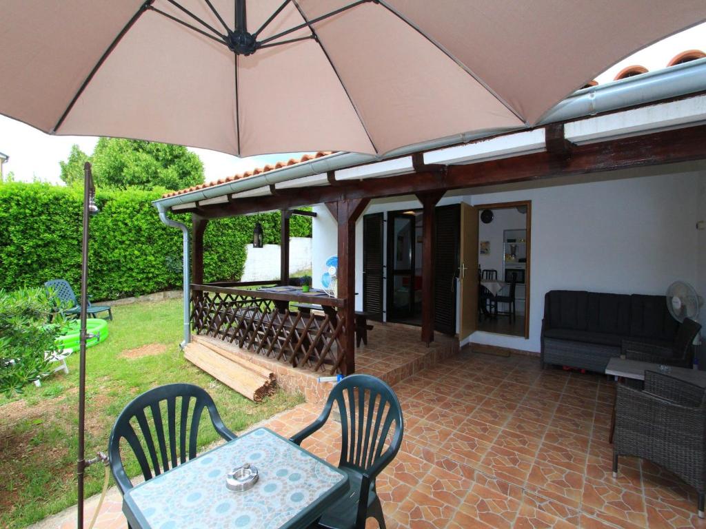 Vonkajšia záhrada v ubytovaní Apartment GIARDINO