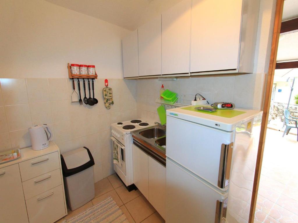 Kuchyňa alebo kuchynka v ubytovaní Apartment GIARDINO