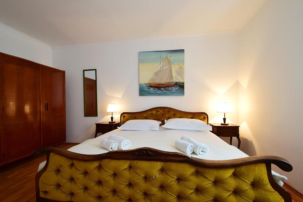 Postel nebo postele na pokoji v ubytování Apartments Odrina