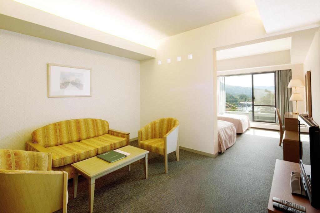 TV a/nebo společenská místnost v ubytování Izumigo AMBIENT Tateshina Hotel