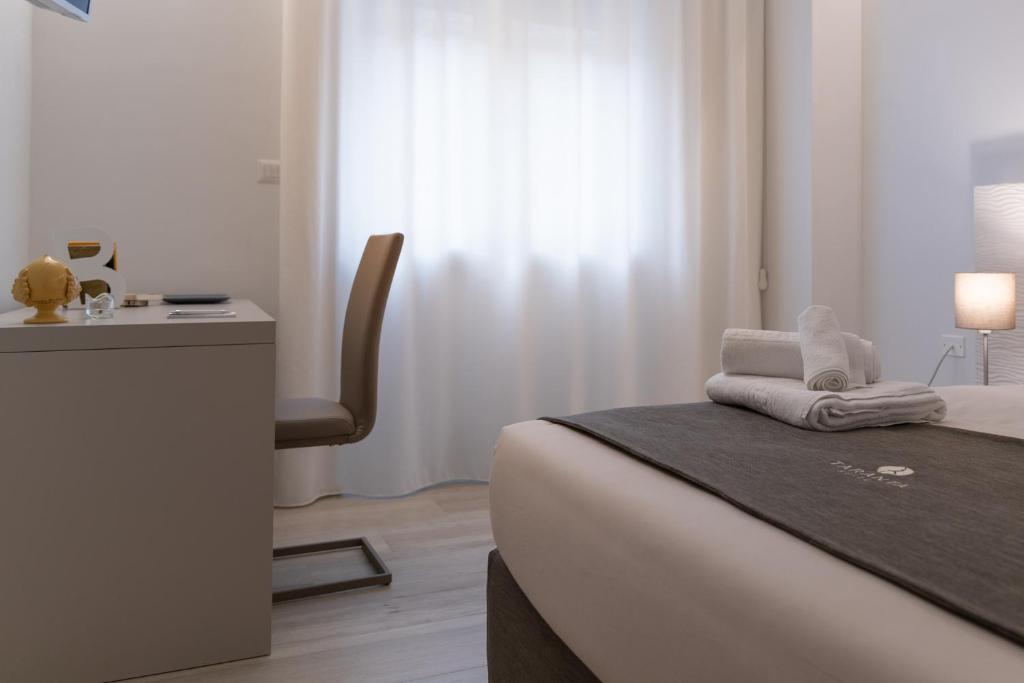 Ένα ή περισσότερα κρεβάτια σε δωμάτιο στο Taranta Suite