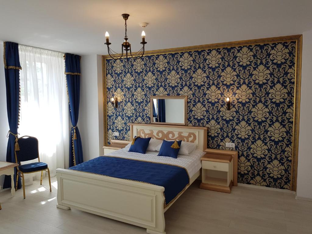 Postel nebo postele na pokoji v ubytování Vila Bohemia