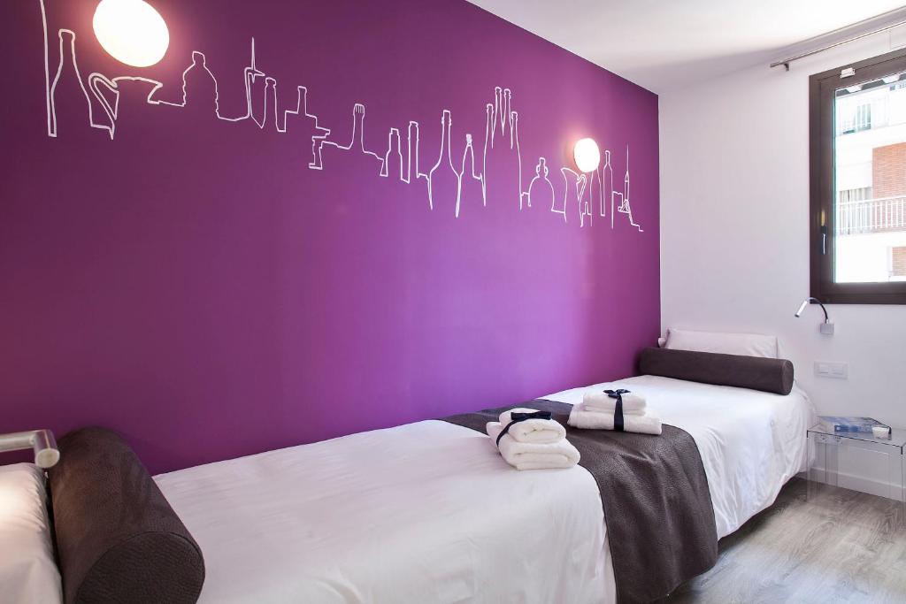 Posteľ alebo postele v izbe v ubytovaní Habitat Apartments ADN