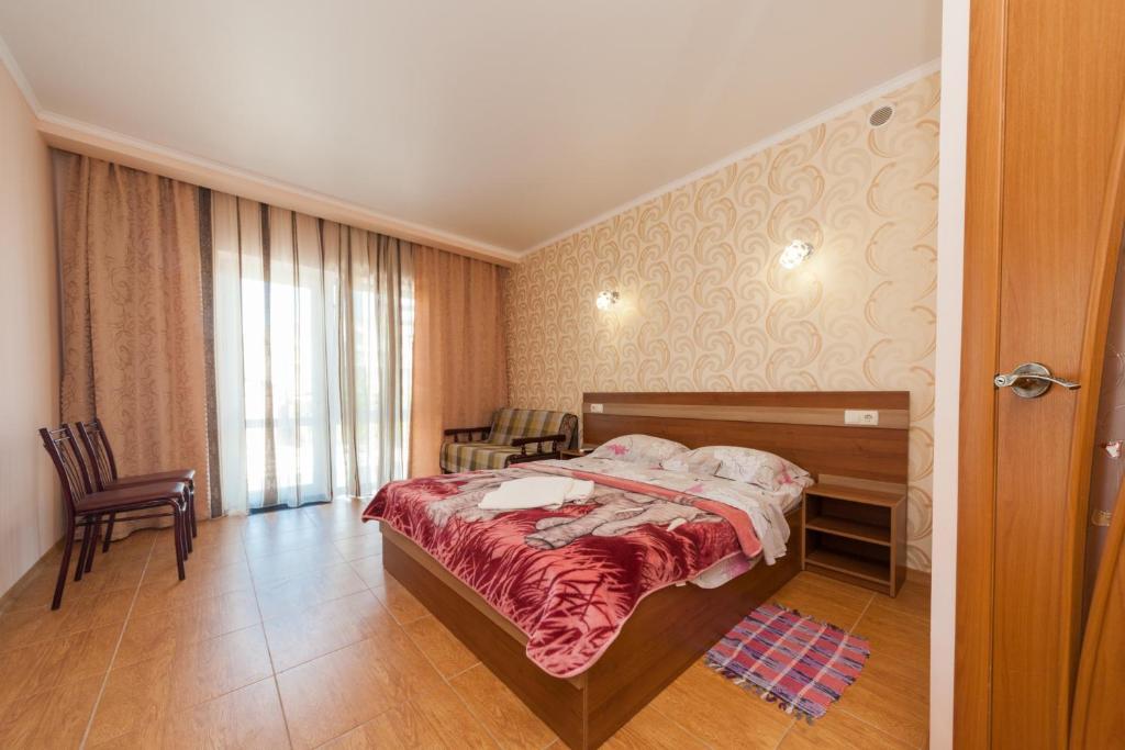 Postel nebo postele na pokoji v ubytování Villa Orchidea