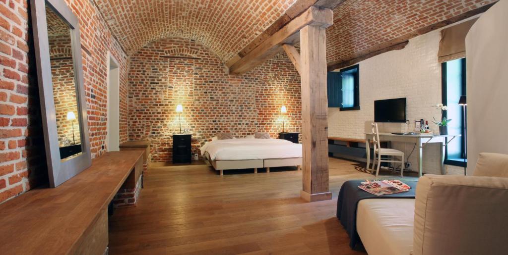 Ένα ή περισσότερα κρεβάτια σε δωμάτιο στο Hotel The Lodge Heverlee