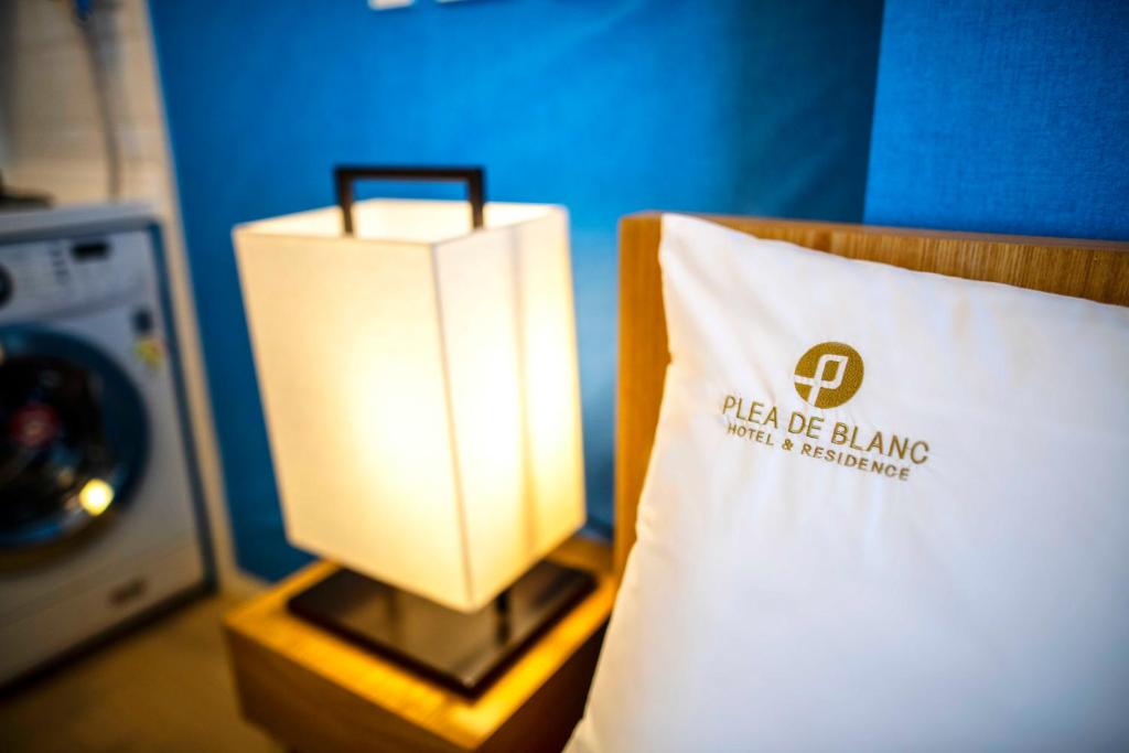 Certifikát, hodnocení, plakát nebo jiný dokument vystavený v ubytování Plea De Blanc Hotel & Residence
