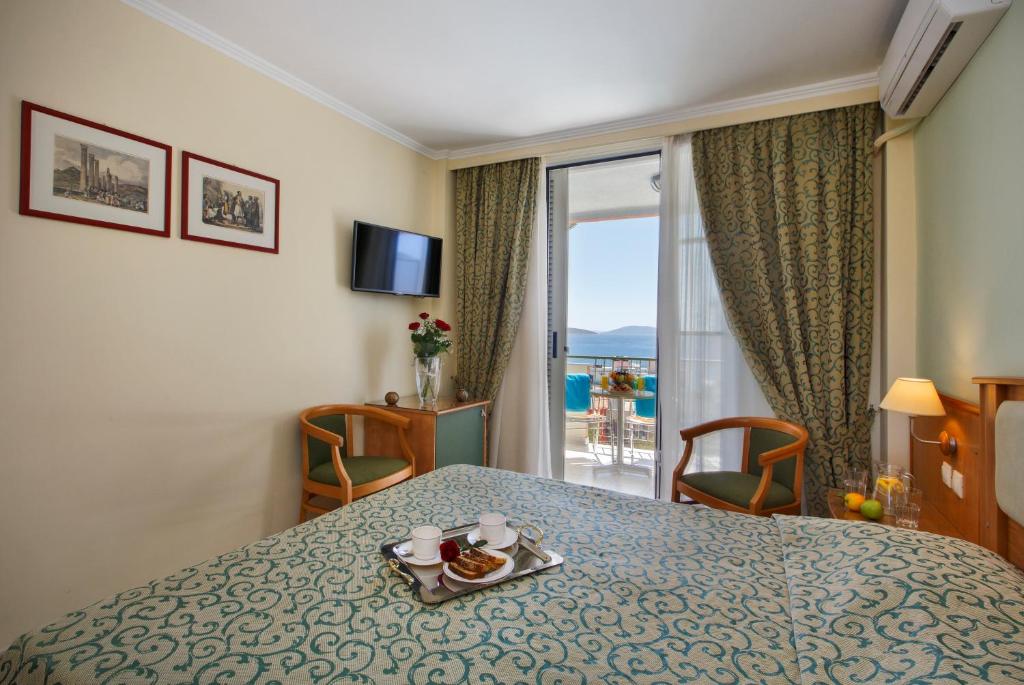 Postel nebo postele na pokoji v ubytování Tolon Holidays Hotel