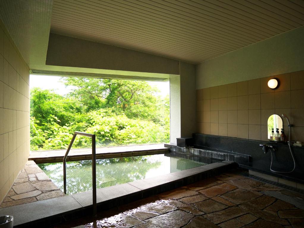 Bazén v ubytování Wisterian Life Club Usami nebo v jeho okolí
