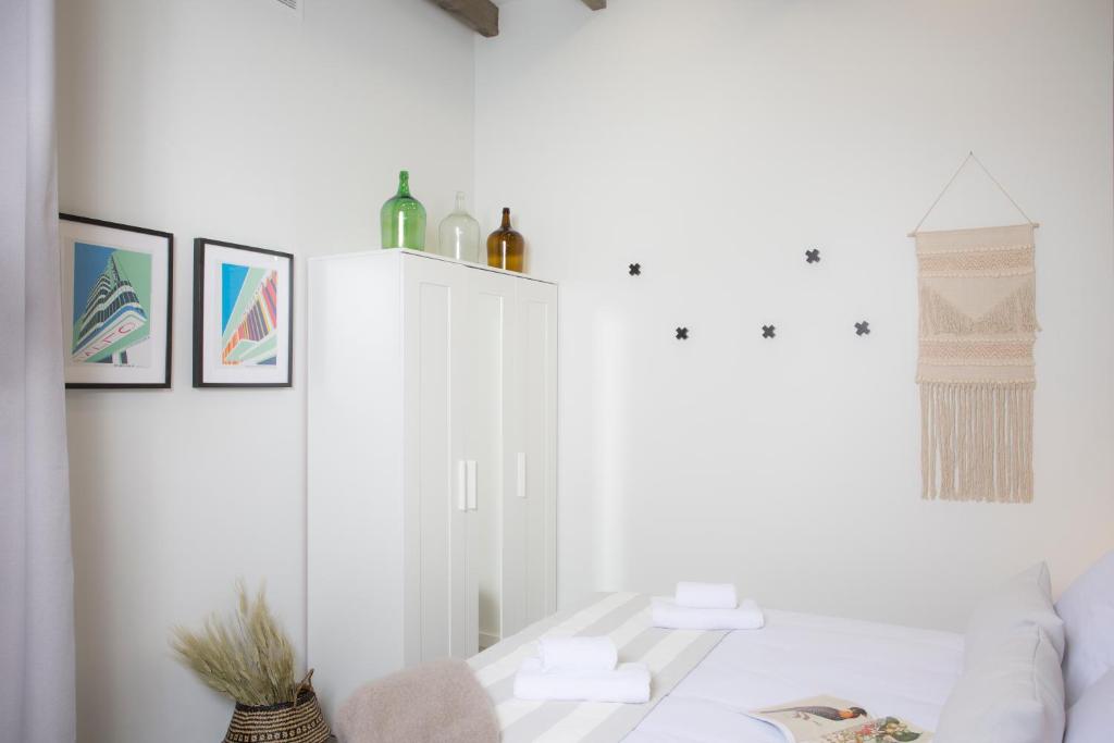 Posteľ alebo postele v izbe v ubytovaní Buenos Aires Apartments