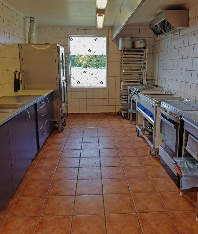 Kuchyň nebo kuchyňský kout v ubytování Träkumla boende