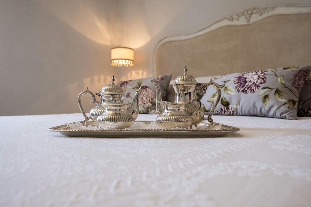 Postel nebo postele na pokoji v ubytování Santa Lucia B&B