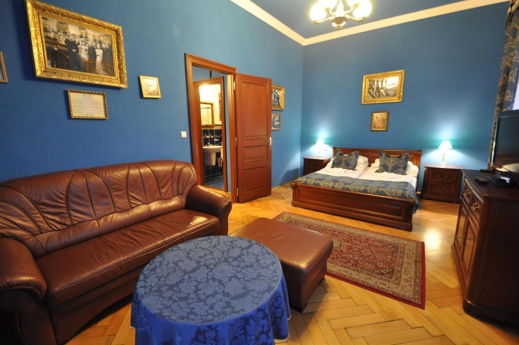 Postel nebo postele na pokoji v ubytování Grand Hotel Praha