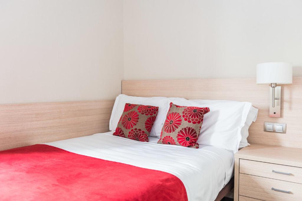 Postel nebo postele na pokoji v ubytování Casp 74 Apartments
