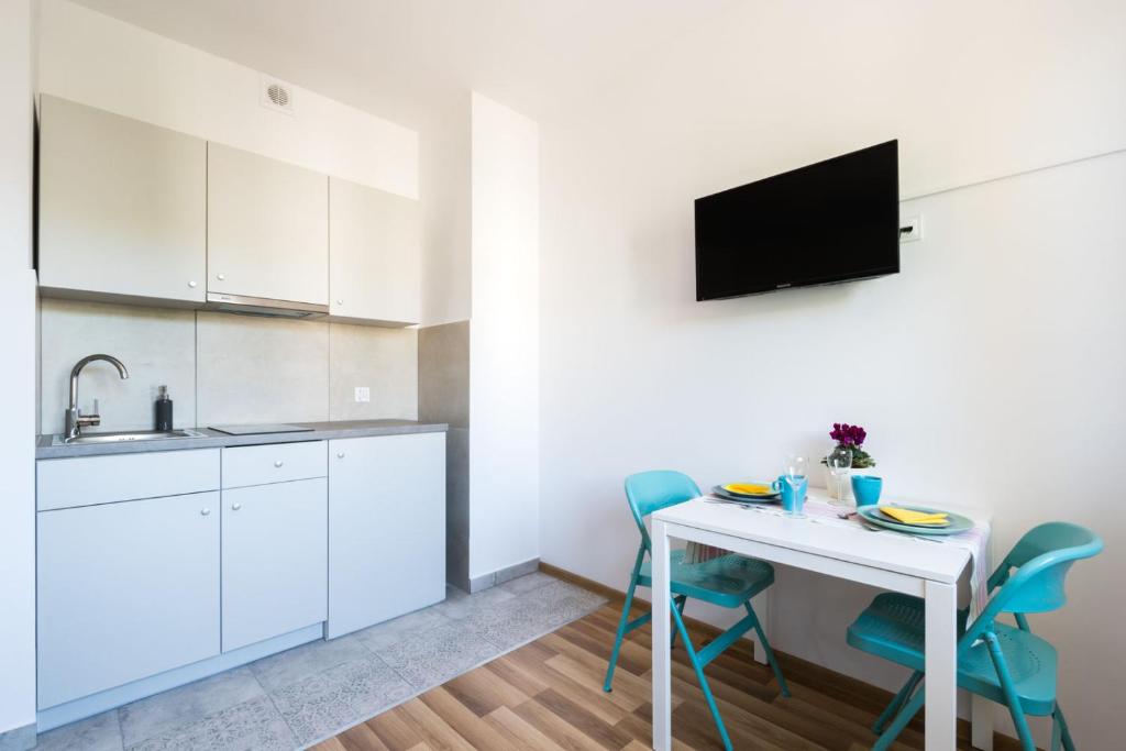 Kuchyňa alebo kuchynka v ubytovaní Art Apartments