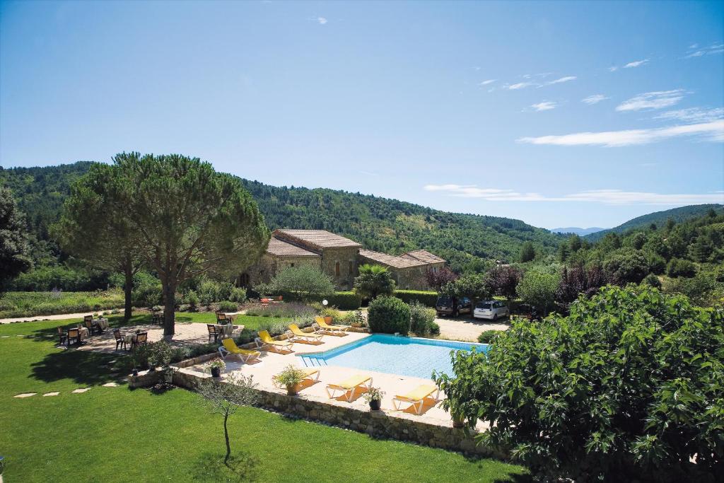 an aerial view of a villa with a swimming pool at Logis Hôtel Restaurant Le Chêne Vert in Rocher