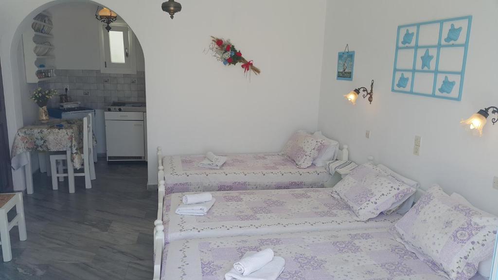 Postel nebo postele na pokoji v ubytování Augusta Studios & Apartments