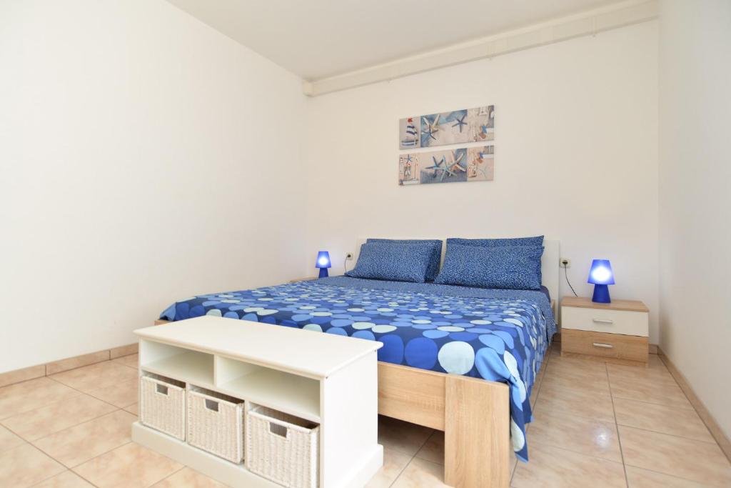 Posteľ alebo postele v izbe v ubytovaní Apartments Veljko 100