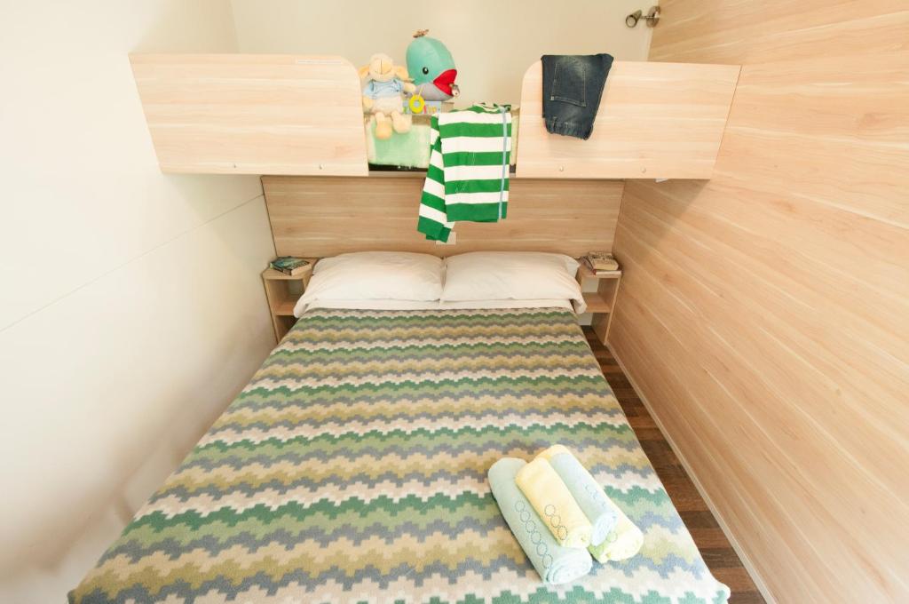 Voodi või voodid majutusasutuse Camping Serenissima toas