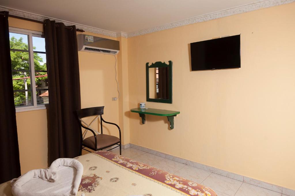 TV a/nebo společenská místnost v ubytování Residencial Turistico Cuba