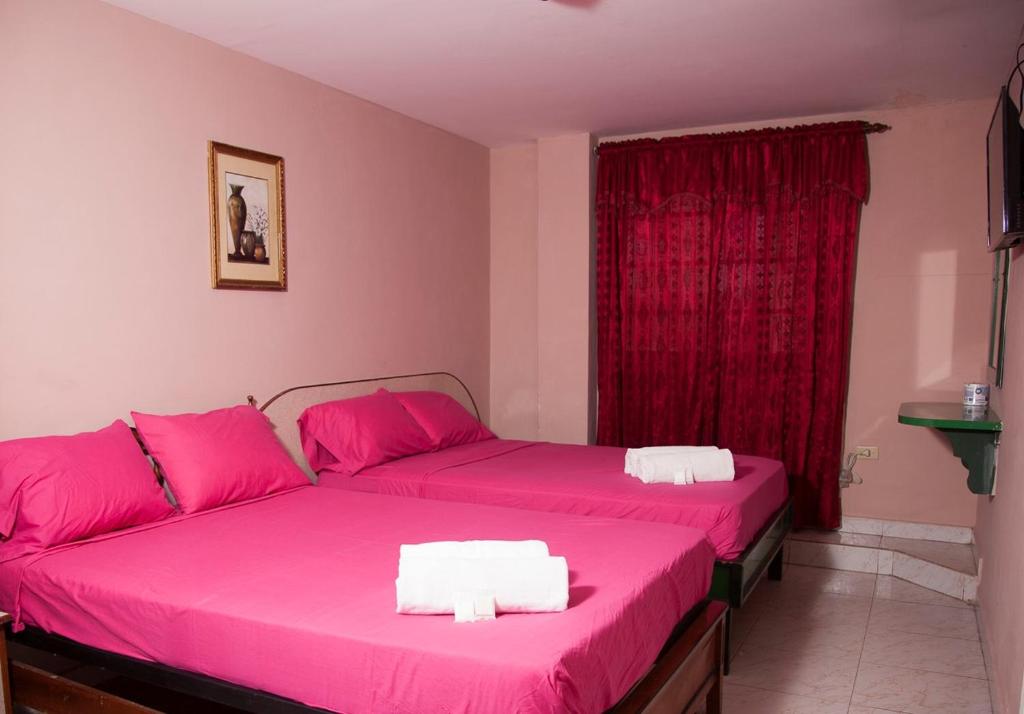 Postel nebo postele na pokoji v ubytování Residencial Turistico Cuba