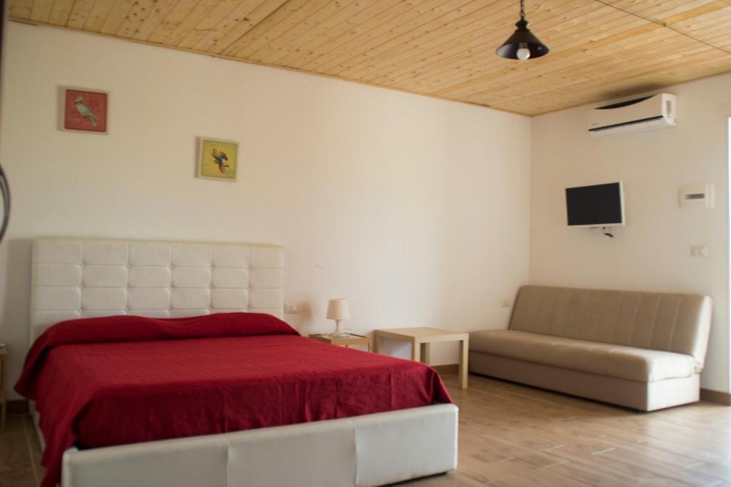 Postel nebo postele na pokoji v ubytování Fontana La Pietra