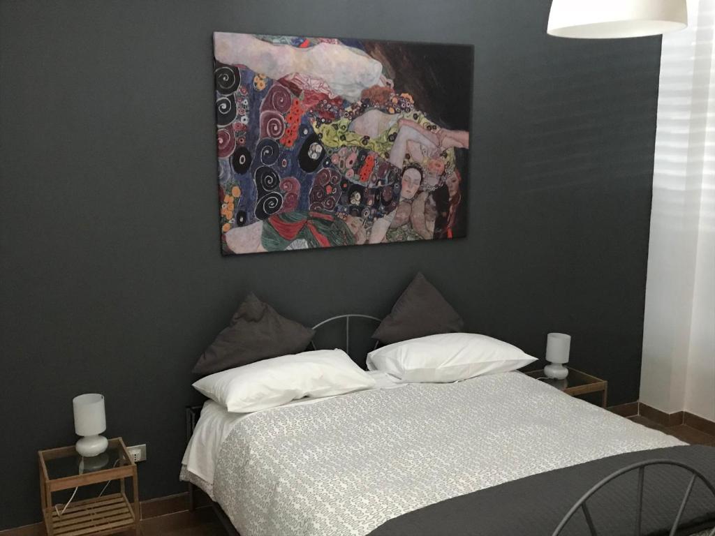 Posteľ alebo postele v izbe v ubytovaní L'albero Dei Limoni B&B