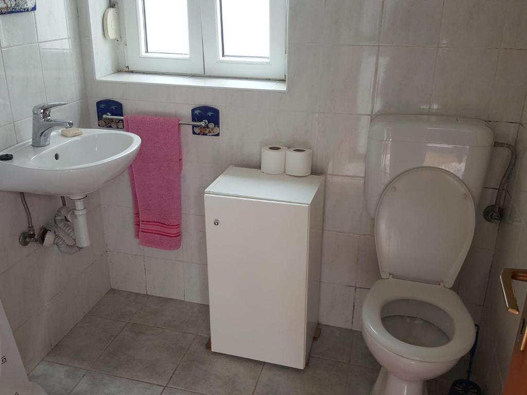 Koupelna v ubytování Apartmani Sole