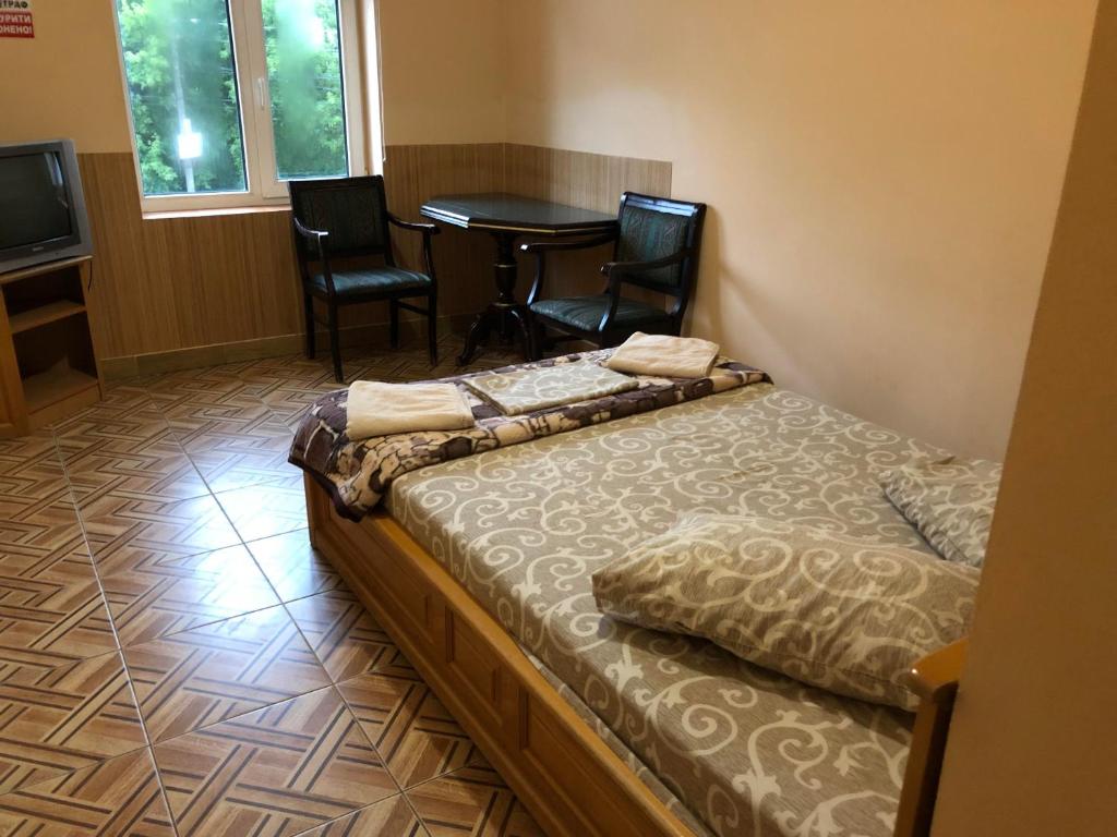 Postel nebo postele na pokoji v ubytování Мотель "Євро"