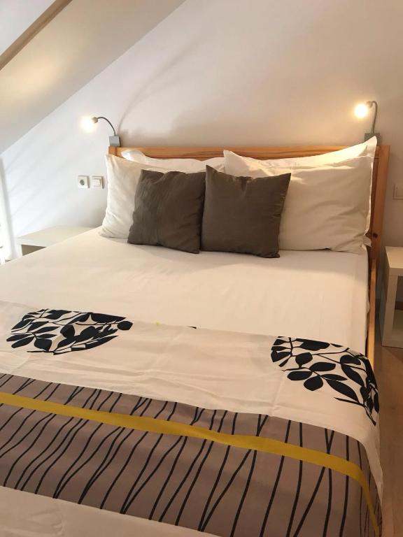 Posteľ alebo postele v izbe v ubytovaní Villa Jani Top Floor Suite