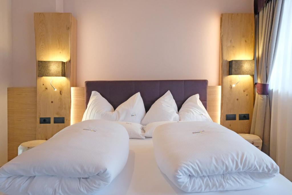 Postel nebo postele na pokoji v ubytování Vidor Resort