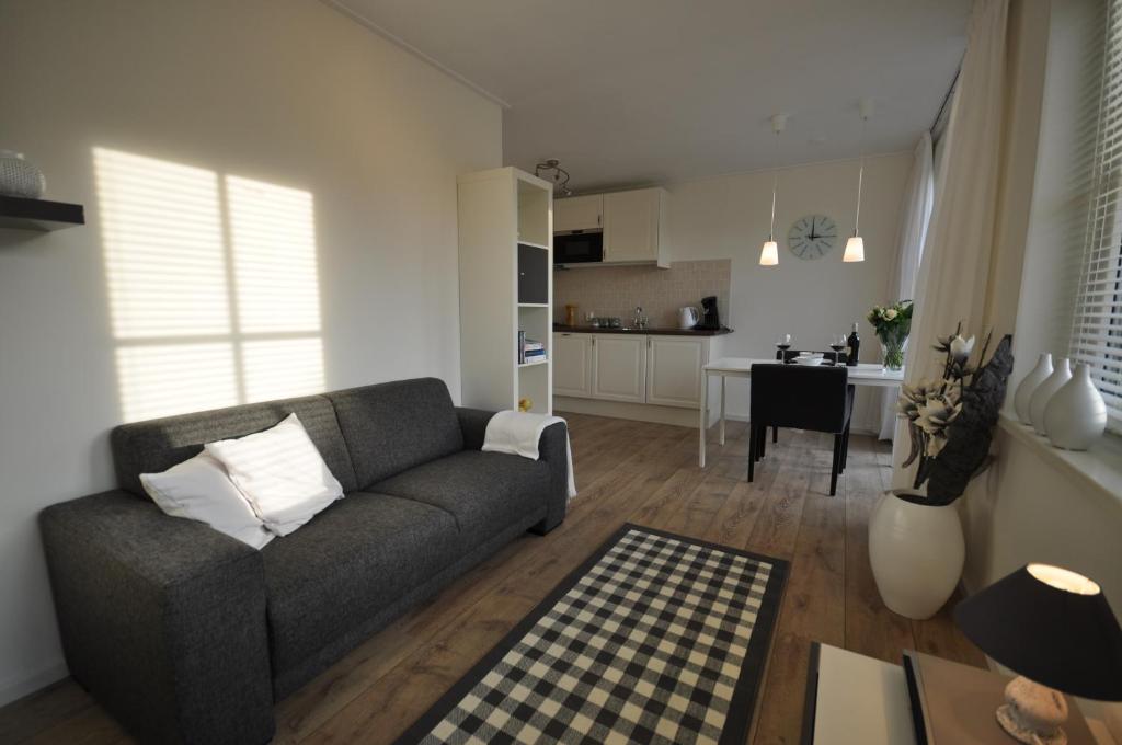 Posezení v ubytování Appartement Eigen Tijd