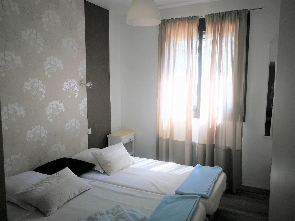 Postel nebo postele na pokoji v ubytování Terrasses de l'Aven